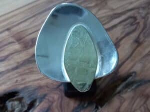 Herinneringsring Zilver met gouden opzet.