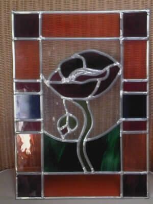 Klaproos in glas in lood